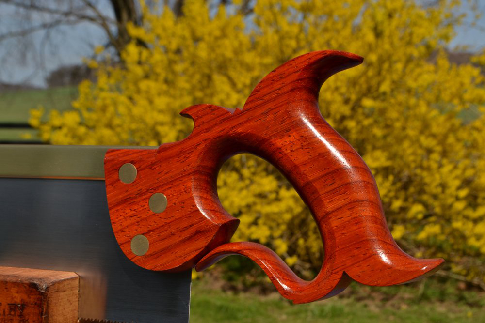 Close-up of handle on 12 inch  carcase saw in padauk