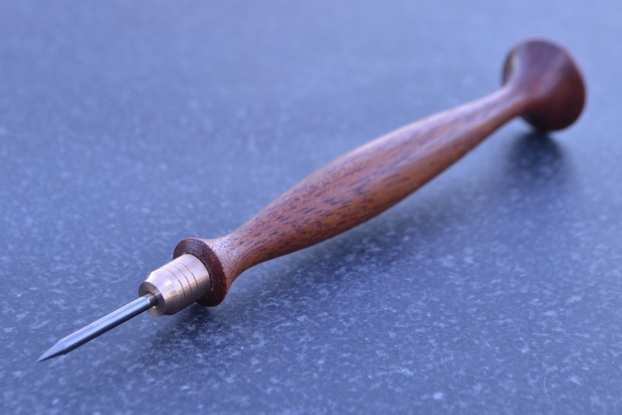 Carbide Scrawl in mahogany and bronze - point
