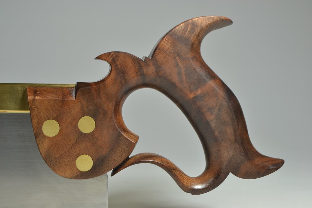 Close-up of handle on 12 inch  carcase saw in walnut crotch